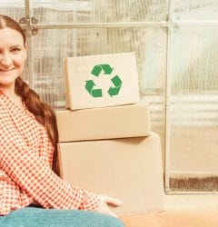 Woman Holding Boxes Eco-Friendly Packing Supplies